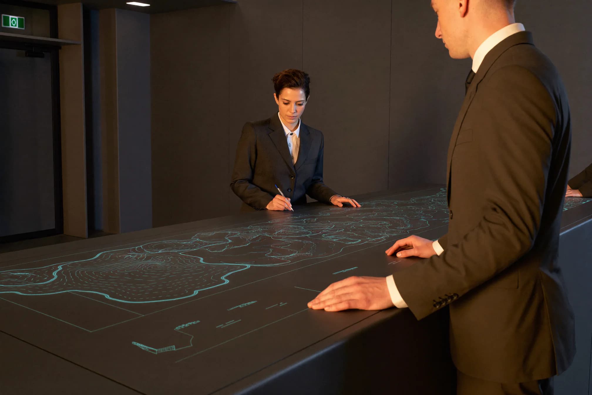 Public-sector professionals reviewing a secure scenario-based simulation environment